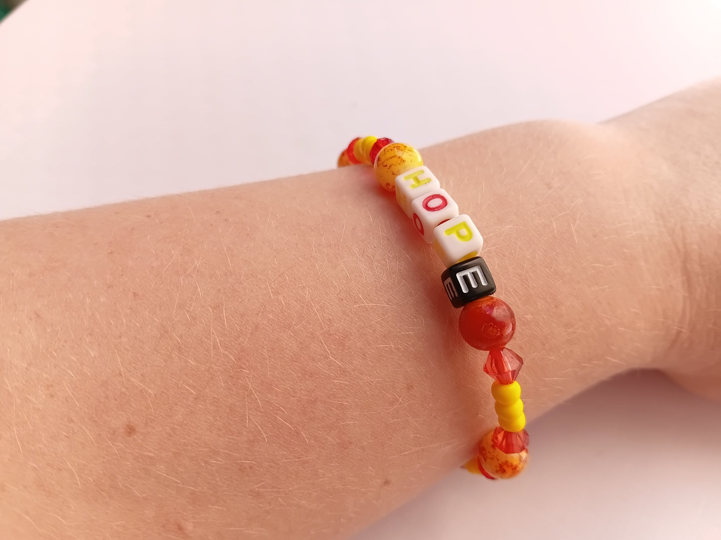 Yellow and red HOPE bracelet and earring set