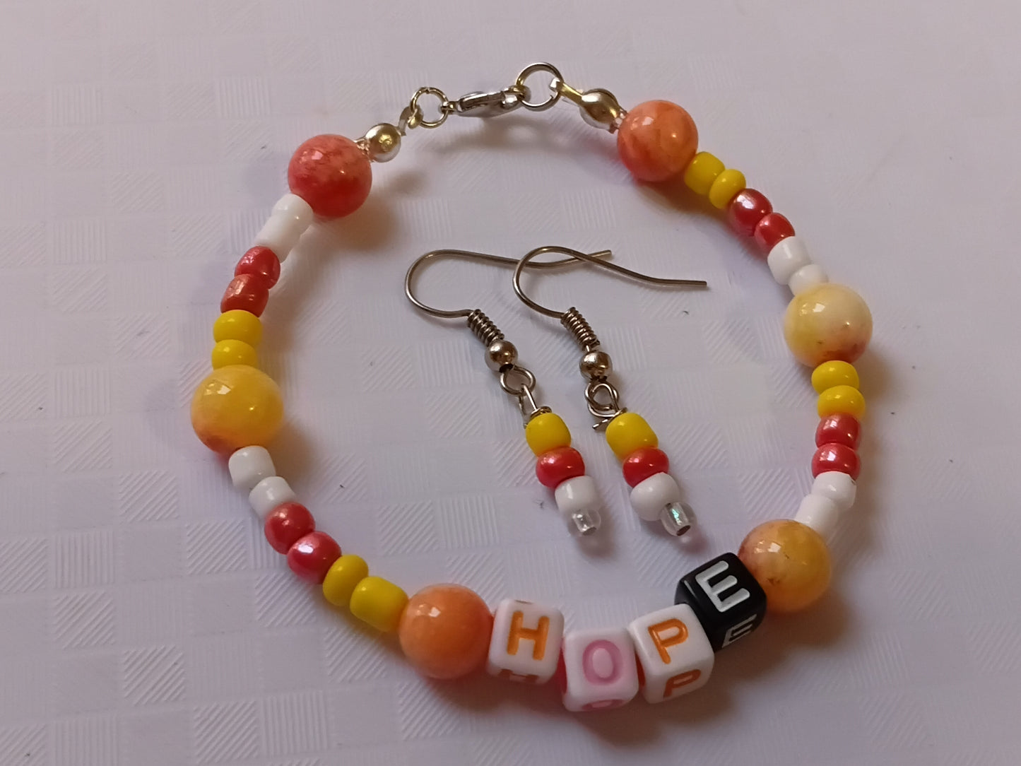 Peach, yellow and white HOPE bracelet and earring set